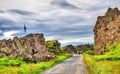 Road in a fissure between tectonic plates in the Thingvellir National Park - Iceland