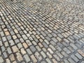 Road or foot path stone surface. Abstract texture for design. Rough stone surface. Traditional construction material Royalty Free Stock Photo