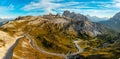 Road at foot of rocky mountain in Tre Cime di Lavaredo Royalty Free Stock Photo