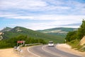 Road in foothills with old radar stations of Caucasus, Krasnodar region, Russia Royalty Free Stock Photo