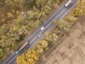 Road through the forest, Aerial view car truck drive going through forest, Aerial top view forest, Texture of forest Royalty Free Stock Photo