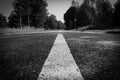 Road into the forest. Black and white with vignette Royalty Free Stock Photo