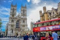 Road in front of Westminster Abbey full of cars, buses and tourists in the city of Westminster, London, UK Royalty Free Stock Photo