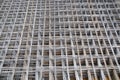 Road galvanized mesh with large cells folded in a stack. Construction design, production
