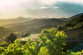 Road going through foggy mountains, Corbieres, France