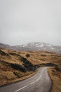 Road going through Scottish Highlands near Lochinver.