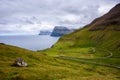 Road going to Trollanes village on Kalsoy in Faroe Islands, Denmark