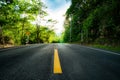 Road going through a trees Royalty Free Stock Photo