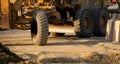 Road grader working at construction site for maintenance and construction of dirts and gravel road. Yellow motor grader. Heavy Royalty Free Stock Photo