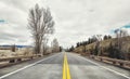 Road in Grand Teton National Park, color toning applied, Wyoming, USA Royalty Free Stock Photo