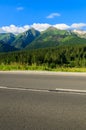 Road in green summer landscape of Tatra Mountains in Zdiar village, Slovakia Royalty Free Stock Photo