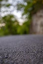 Road from the ground level with green bokeh background Royalty Free Stock Photo