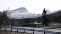 Road at Gudbrandsjuvet gorge in Valldola valley on Trollstigen route in snow in Norway Royalty Free Stock Photo