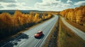 road highway autumn forest. the car is driving on the road Royalty Free Stock Photo