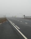 Road, highway in fog gray heavy fog, Royalty Free Stock Photo