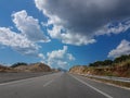 road highway street clouds blue sky