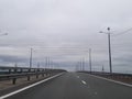 A road or a highway, the highway stretches to the horizon. View from the car window. Journey, the way home.