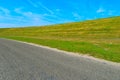 Road and hill with a sky background