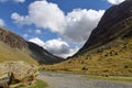 Road in Honister Pass with Yew Cragg and Honister Cragg, from Buttermere, Cumbria