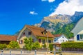 Road and houses near the mountains in Vaduz, Oberland Liechtenstein Royalty Free Stock Photo