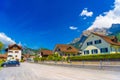 Road and houses near the mountains in Vaduz, Oberland Liechtenstein Royalty Free Stock Photo