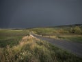 Dramatic light over a hungarian country road