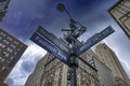 Road instersection sign in Midtown Manhattan under a coming storm, New York, USA Royalty Free Stock Photo