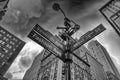 Road instersection sign in Midtown Manhattan under a coming storm, New York, USA Royalty Free Stock Photo