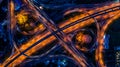 Road interchange in the city at night with vehicle car light movement, Aerial view Royalty Free Stock Photo