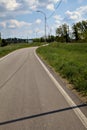 Road in the italian countryside in spring on a clear day Royalty Free Stock Photo