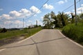 Road in the italian countryside in spring on a clear day Royalty Free Stock Photo