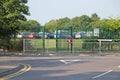 Road Junction And Parked Cars In A Field