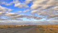 The road through the Karakum desert. The road from Ashgabat to Dashoguz passes through the Karakum desert. The desert occupies 7 Royalty Free Stock Photo