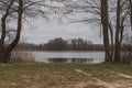 The road by the lake on a cloudy rainy day