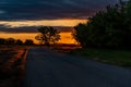 A Road Leading to a Beautiful Sunrise on the Plains of Colorado