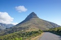 A road leading to Lions Head in Cape Town, South Africa against blue sky copyspace on a sunny morning. A highway along a Royalty Free Stock Photo