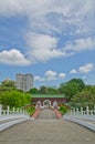 Road leading to old gate and modern city