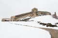 Road Leading to an Old Medieval Fortress in Winter Royalty Free Stock Photo