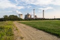 Road Leading To Power Plant Royalty Free Stock Photo