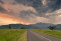 A road leading towards Champagne Castle mountains, Drakensberg, South Africa