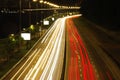 Road with light trails in city, motion blur effect Royalty Free Stock Photo