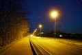 Road lights in night, street post shadow Royalty Free Stock Photo