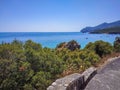 Road and vegetation and mountain of Serra da ArrÃ¡bida Natural Park with blue sea, SetÃºbal PORTUGAL