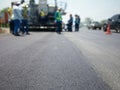 Road maintenance by burning old materials and improving quality Royalty Free Stock Photo