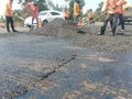 Road maintenance work using human labor