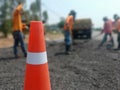 Road maintenance work using human labor blurred image