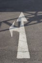 Road marking arrow on asphalt Royalty Free Stock Photo