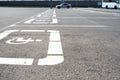Road marking on the asphalt with parking spaces for the disabled Royalty Free Stock Photo
