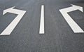 Road markings-with two arrows pointing in opposite directions Royalty Free Stock Photo