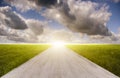 A Road between the meadow with Moving Clouds Royalty Free Stock Photo